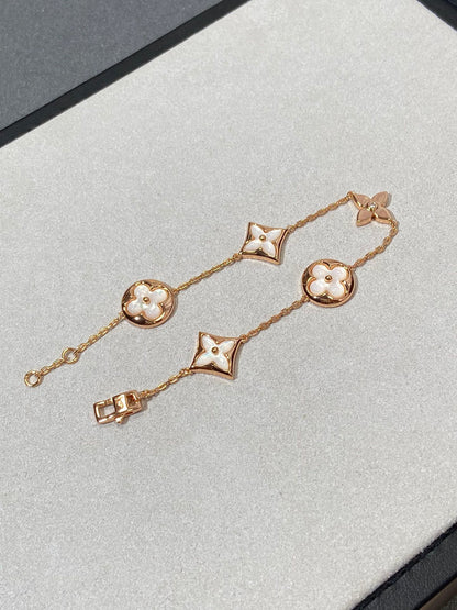 [LUCKY LOVE]STAR AND SUN 5 MOTIF MOP PINK GOLD BRACELET